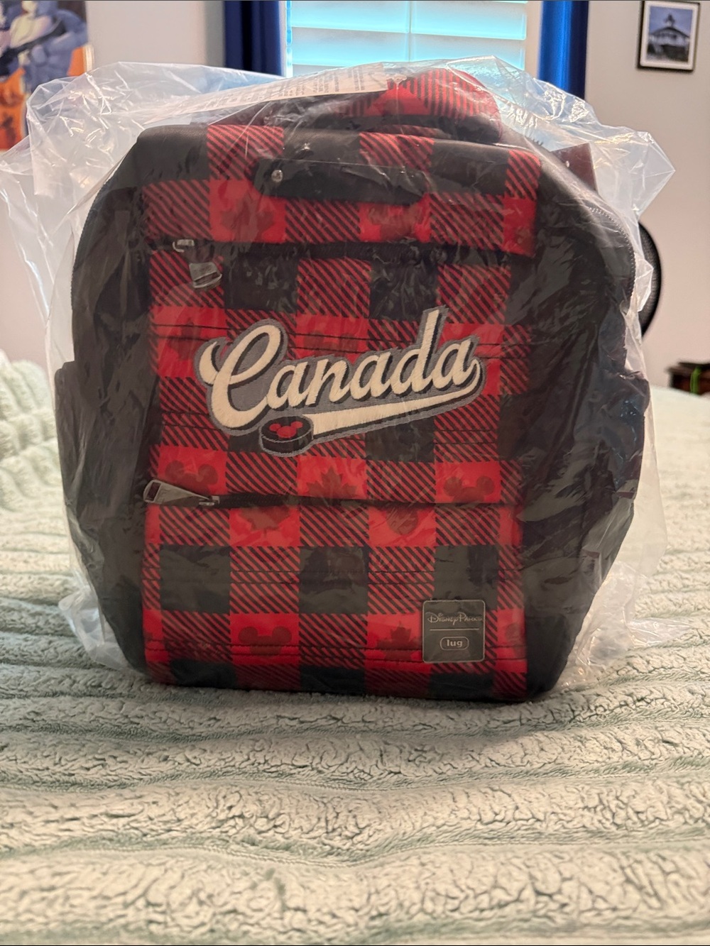 lug Mini Backpack in Red and Black Buffalo Plaid with Canada Script